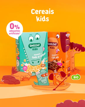 Cereais biológicos SMILEAT Kids com aveia integral, 0% adoçantes artificiais e sabores original e cacau.
